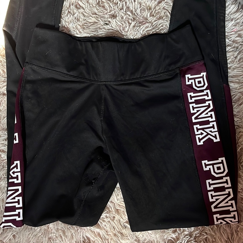 two pairs of PINK ULTIMATE leggings both size medium.